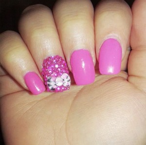 This is a pink look with a accented cheetah print pow with rhinestones. 