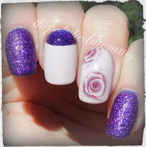  #nailartsep :fav flower. http://www.thepolishedmommy.com/2013/10/roses-are-red-violets-are-ooohhh.html

Rose water decals available at BornPrettyStore.com and use the code NKL91 for 10% off your order.