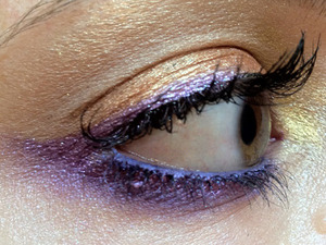 I wanted to make my eyes pop combining bronzy Amber lights and purple.