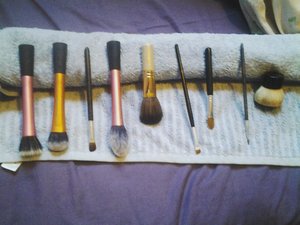 I finally cleaned my brushes! I used baby shampoo and lukewarm water, swirled the brush around and then worked it in slightly with my fingers and swirled again. Then I ran it under the cold tap until the water ran clear

L - R

Real Techniques stippling brush 
Real Techniques expert face brush 
Jerome Alexander eyeshadow brush 
Real Techniques blush brush
BareMinerals limited edition flawless face brush 
Royal Connections angled brush 
Bare Escentuals max coverage concealer brush 
Jerome Alexander lip brush
BareMinerals flat top kabuki brush 
