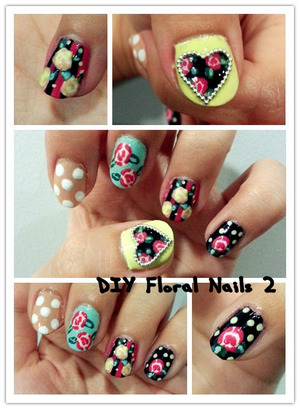Painted floral nails on my left hand! This one took me quite a long time since I'm a left-handed and I'm doing it with my right hand. Used toothpick and dotting tool as well and some beads to make the heart shape pop!
