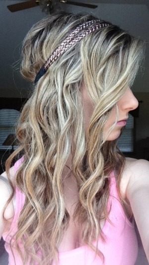 To create this look I used to wand to make loose curls, then I teased the top of my hair to create volume. I hair sprayed it and added the cute headband. Super easy and cute! 
