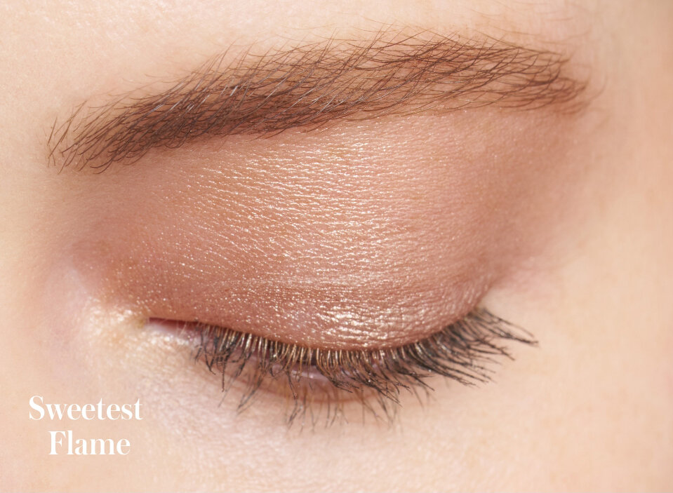 Model wearing the shade Sweetest Flame from the rms beauty Celestial Dream ReDimension Hydra Eyes Quartet