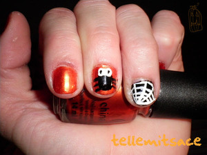 first attempt at freehand nail art. happy halloween!