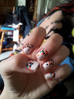 white base with teal, purple, and neon orange dots