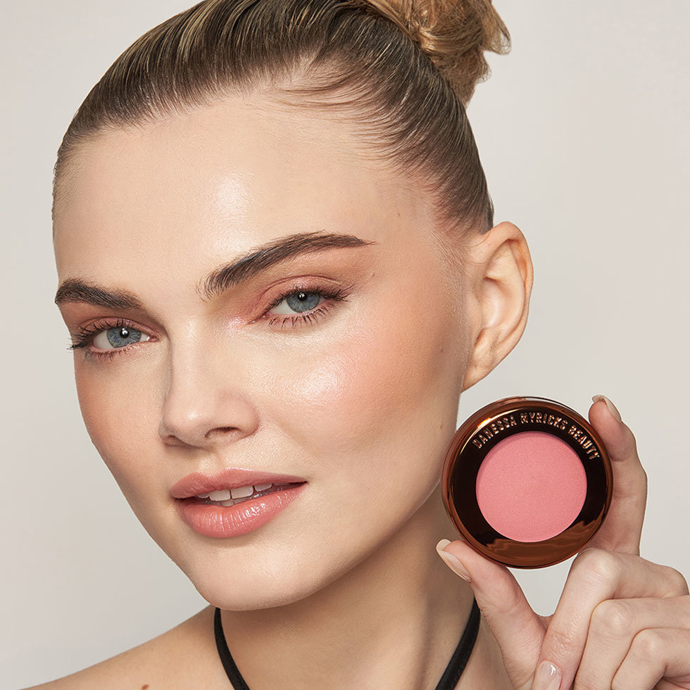 Danessa Myricks Beauty model wearing the Yummy Skin Blurring Balm Powder Lowlighter in Unbothered