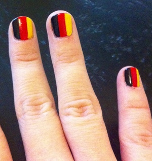 German flag nails for Oktoberfest. I used scotch tape and touched up a bit using nail art polish. (Colors used: Sparitual Hunk of Burnin' Love and Street Smart & Jordana Pop Art Nail Design in Black Mark and Express in Yellow)