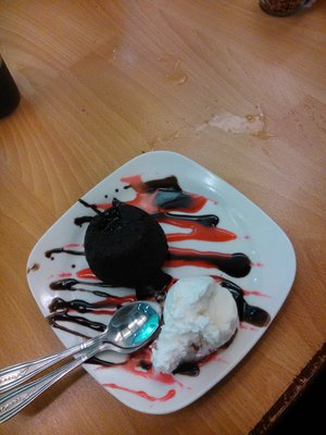 I don't know how much calorie it contains but I love that CHOCOLATE LAVA CAKE... <3