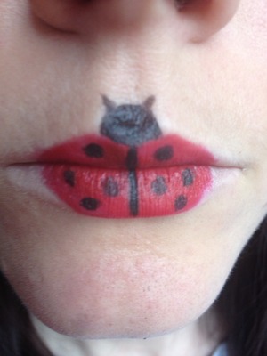 Love these ladybird lips created using pout paint an a kohl eyeliner