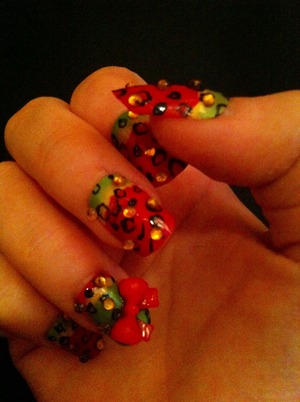 Fun cheetah nail design using bright colours and 3D nail art!:)