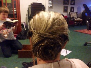 A slightly a-symmetrical bun I did on my aunt.  It took 8 separate braids,20 minutes and about 12 bobby pins.