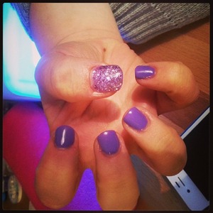 Purple gel nails with one glittery! 