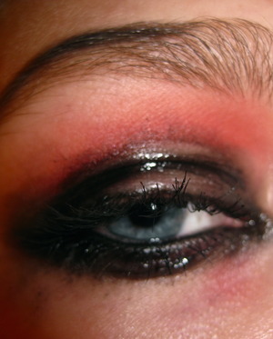 Dark glossy black eye with soft red crease. :)