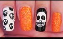 Skulls & Glittery Orange nail art