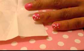 Pink nails with white polka dots
