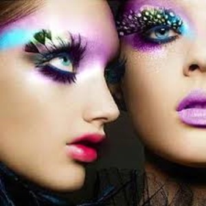 mascara: black
false eyelashes: feathers , black 
eye makeup: purple , blue