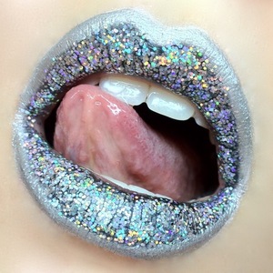 I had a cool idea for full on glitter lips and went all out with M.A.C Reflects 3D Silver as the focus and Sugarpill's Tiara as a liner, with OCC Lip Tarred as a base behind all the sparkle!