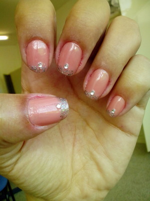 pink nails with french bright and a point light.