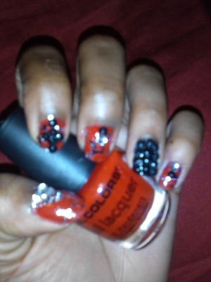 Black Bejeweled red nails with sparkles