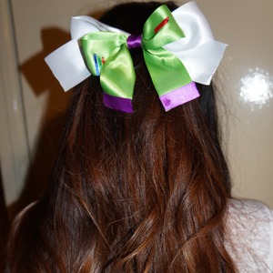 Check out my youtube channel if you want to see how to make your own Buzz Lightyear bow :)