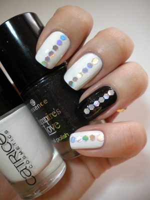 http://​missbeautyaddict.blogspot.c​om/2012/03/​31-day-challenge-black-and-​white-nails.html
