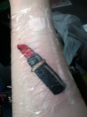 I got a tube of red lipstick tattooed on my right forearm about a week ago and I am IN LOVE.