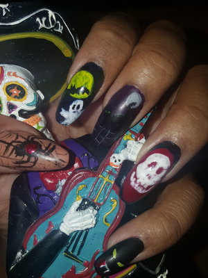 Hand painted by me on my own nails. 
Used acrylic and tempera paints for the designs. 

Hope you like! 