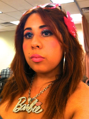 This is my finished fantasy make-up I did for class. Her background story is that she was a retro 80's party Barbie. ;p