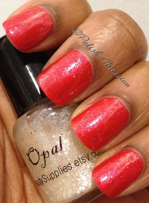 Layered over red.  Love this shimmer top coat!