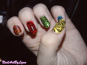 This is a very nice design for the summer. You can put the colours in the order of the rainbow or just random. I added the designs for a nice shimmer. For more photo's and information, check my blog: http://nailartbylynn.tumblr.com/