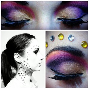 Rainbow eye makeup look, gems, fake eyelashes, colourful.