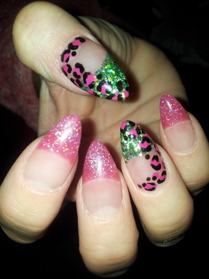 Pink and green glitter nails with leopard print design 
