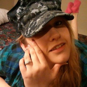 I went to Florida to visit my boyfriend who is in the navy and stationed there. He asked me to marry him. The day after that after he came home from school I stole his hat, he thought I looked so beautiful that he wanted to take a picture.