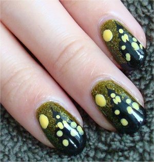 Haunted House Nails
Nail tutorial & more photos here: http://www.swatchandlearn.com/nail-art-tutorial-haunted-house-nails/