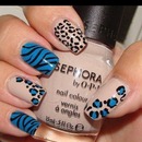 Neutral and Blue Nails with Cheetah and Tiger Prints