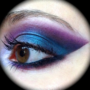 I went to see the new Die Hard movie: A good day to Die Hard and went for a femme fatale look for the makeup.
The shape and colours of the makeup was inspired by GlitterGirlC's Disney good vs. evil makeup where she used Sugarpill's Lumi over a black shadow and blended it out to a purple. And also Goldiestarling's easy cat eye look; I used her technique with the black shadow and tape. I really loved these looks so much I had to incorporate some of the elements into this look.

http://michtymaxx.blogspot.com.au/2013/04/a-good-day-to-die-hard-makeup-ootd.html