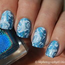 Blue holo and white roses nail art