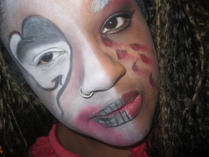 Playing with face paints with my face