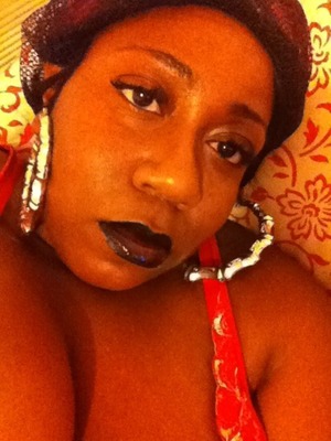 Black lip liner shaded in and a plum like lip gloss out of my Sephora palette.