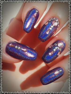 Purple Holographic Bling Nails

Base color is KBshimmer's Quick and Flirty holographic polish.