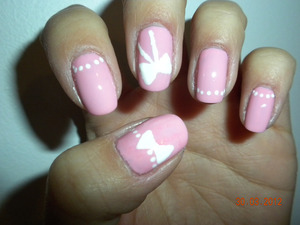 OPI Nicki Minaj Pink Friday solids with white bow detailing