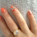Sparkly bright nails with rhinestone bow 