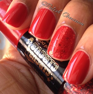 Dual ended polish with a red creme and red glitter.

http://www.polish-obsession.com/2013/02/essence-applause-applause.html