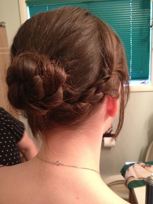 Quick and easy bun made with 3 braids!
