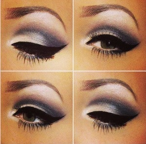 drastic grey and white eyeshadow, with think eyeliner and lashes for full effect. 