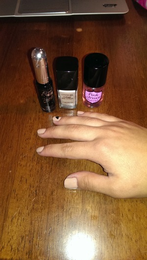 Nude w black heart accent nail using Covergirl outlast stay brilliant in Forever Fawn and black Kiss striper