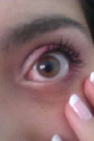 Soft eye makeup in pink and white and a french mani