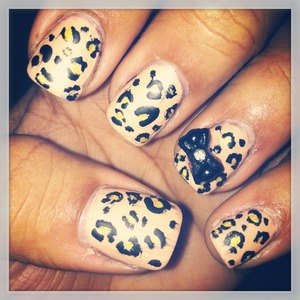 Sunset sail leopard nails with a matte topcoat 