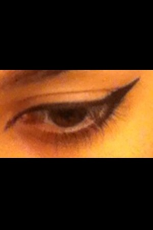 I did this with a liquid eyeliner from a Drugstore!