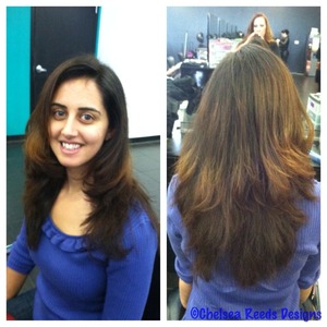 Reworked the layers with lots of point cutting to remove weight.  Then I straightened her very curly hair.  So much fun!